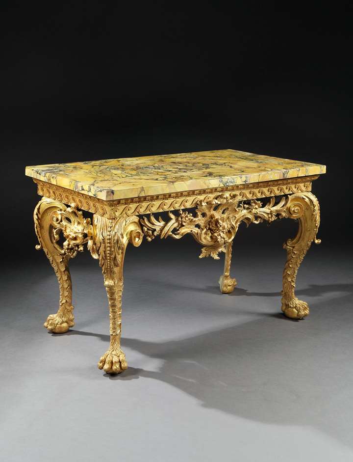 A GEORGE II GILTWOOD SIDE TABLE IN THE MANNER OF MATTHIAS LOCK